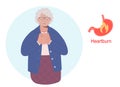 Elderly woman having a heartburn or stomach problem and suffering for this