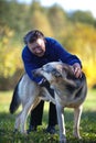 Elderly woman and her pet Royalty Free Stock Photo