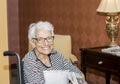 Elderly Woman in her Wheelchair at a Retirement Home Royalty Free Stock Photo