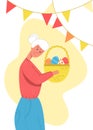 Elderly woman holding basket of Easter eggs