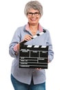 Elderly woman holding a clapboard Royalty Free Stock Photo