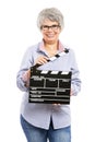 Elderly woman holding a clapboard Royalty Free Stock Photo