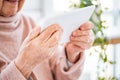 Elderly woman holding tablet Royalty Free Stock Photo