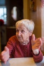 An elderly woman during a lively conversation. Portrait. Royalty Free Stock Photo