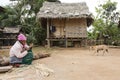 Elderly Woman Making Baskets