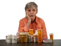 Elderly woman with medications Royalty Free Stock Photo