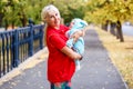 Elderly woman and newborn baby Royalty Free Stock Photo