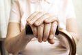 Close up of mature womans hands. Health care giving, nursing home. Parental love of grandmother. Old age related diseases. Royalty Free Stock Photo