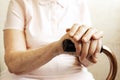 Close up of mature womans hands. Health care giving, nursing home. Parental love of grandmother. Old age related diseases. Royalty Free Stock Photo