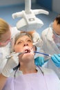 Elderly woman patient open mouth dental checkup