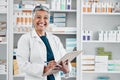 Elderly woman, pharmacist portrait smile and store data of pills stock, insurance or medical documents. Healthcare