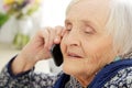 Elderly woman with phone