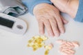 Elderly woman with pills hand, grandmother with medicines