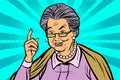 Elderly woman pointing finger up