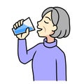 A senior woman drinking water