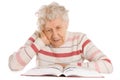 The elderly woman reads the book Royalty Free Stock Photo