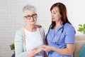 An elderly woman and a rehabilitation doctor - rehabilitation and health concept of older people Royalty Free Stock Photo