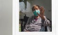 Elderly woman Self-isolation and self-quarantine to help stop the spread of coronavirus COVID-19 Royalty Free Stock Photo