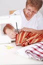 Elderly woman sewing Royalty Free Stock Photo