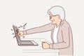 Elderly woman smashes laptop screen by punching it because bad news on website or freezing software Royalty Free Stock Photo