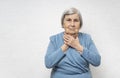 Elderly woman with a sore throat