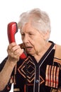 The elderly woman speaks on the phone Royalty Free Stock Photo