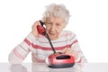 Elderly woman speaks on the phone