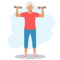 Elderly woman in sports clothes trains with dumbbells. A retired grandmother a pension and a healthy lifestyle