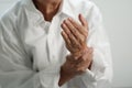 Elderly woman suffering from pain From Rheumatoid Arthritis Royalty Free Stock Photo