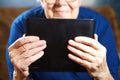 Elderly woman with tablet computer Royalty Free Stock Photo