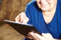Elderly woman with tablet computer Royalty Free Stock Photo