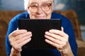 Elderly woman with tablet computer Royalty Free Stock Photo