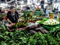 Elderly woman at a Thai market