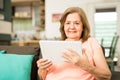 Elderly woman using a tablet computer Royalty Free Stock Photo