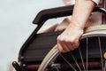 Elderly woman using wheelchair.