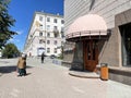 Ekaterinburg, Russia, July, 05, 2021. Elderly woman walks along Yakov Sverdlov Street in Yekaterinburg in the summer