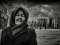 09/10/2015 - An elderly woman wearing a home-knitted woolen shawl and hat