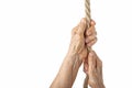 Elderly woman wrinkled hands with rope isolated on white