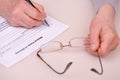 Elderly woman writing testament Royalty Free Stock Photo