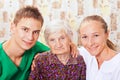 Elderly woman with the young doctors