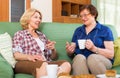 Elderly women at the table with tea Royalty Free Stock Photo