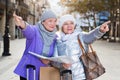 Elderly women tourists with city guide