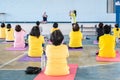 Elderly in a yoga exercise posture