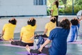 Elderly in a yoga exercise posture