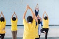 Elderly in a yoga exercise posture