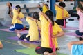 Elderly in a yoga exercise posture