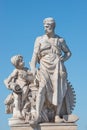 Elderly and young Ã¢â¬â old sculpture of engineer and his scholar on Zoll Bridge in Magdeburg downtown at blue sky background,