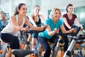 Elderly and young women working out hard Royalty Free Stock Photo