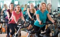 Elderly and young women working out hard in sport club Royalty Free Stock Photo