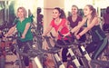 Elderly and young women working out hard in sport club Royalty Free Stock Photo